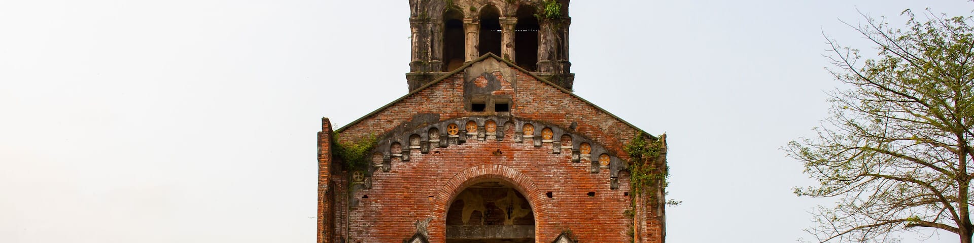 Old Bell Tower Of La Vang Church Remaining After Vietnam War In Hai Lang, Quang Tri, Vietnam. This Place Is One Of The Famous Pilgrimage Places Of The Catholics In Vietnam.