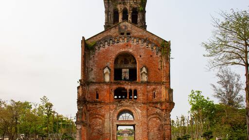 Old Bell Tower Of La Vang Church Remaining After Vietnam War In Hai Lang, Quang Tri, Vietnam. This Place Is One Of The Famous Pilgrimage Places Of The Catholics In Vietnam.