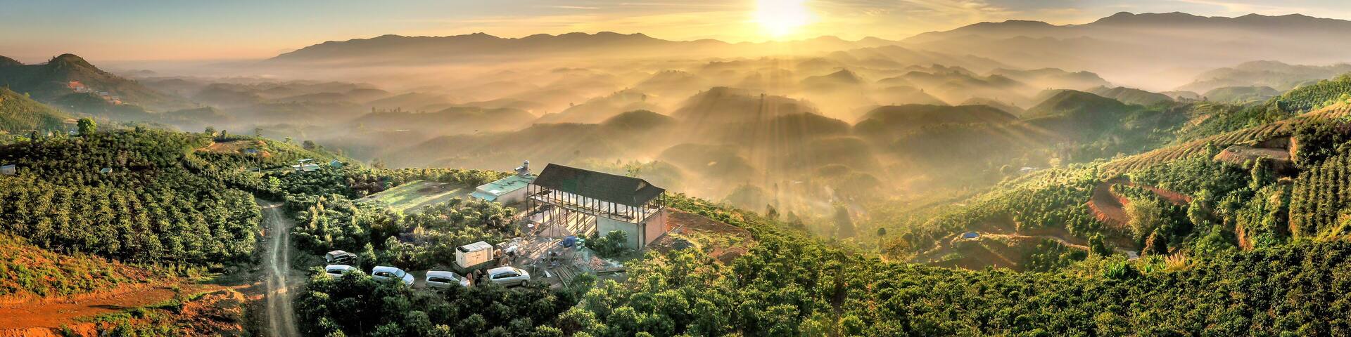 Fanciful scenery of an early morning when the sun rises over the Dai Lao mountain range, Bao Loc district, Lam Dong province, Vietnam