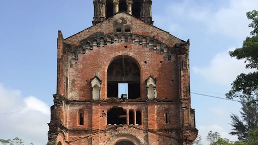 The ruins of โOur Lady of La Vangโ Basilica stand strong since 1798. It is a shrine site to commemorate the help of the โLadyโ to the catholics of Vietnam who were being prosecuted for their faith and found shelter in the rainforest. The โLadyโ appeared to them and gave solution to their illness.