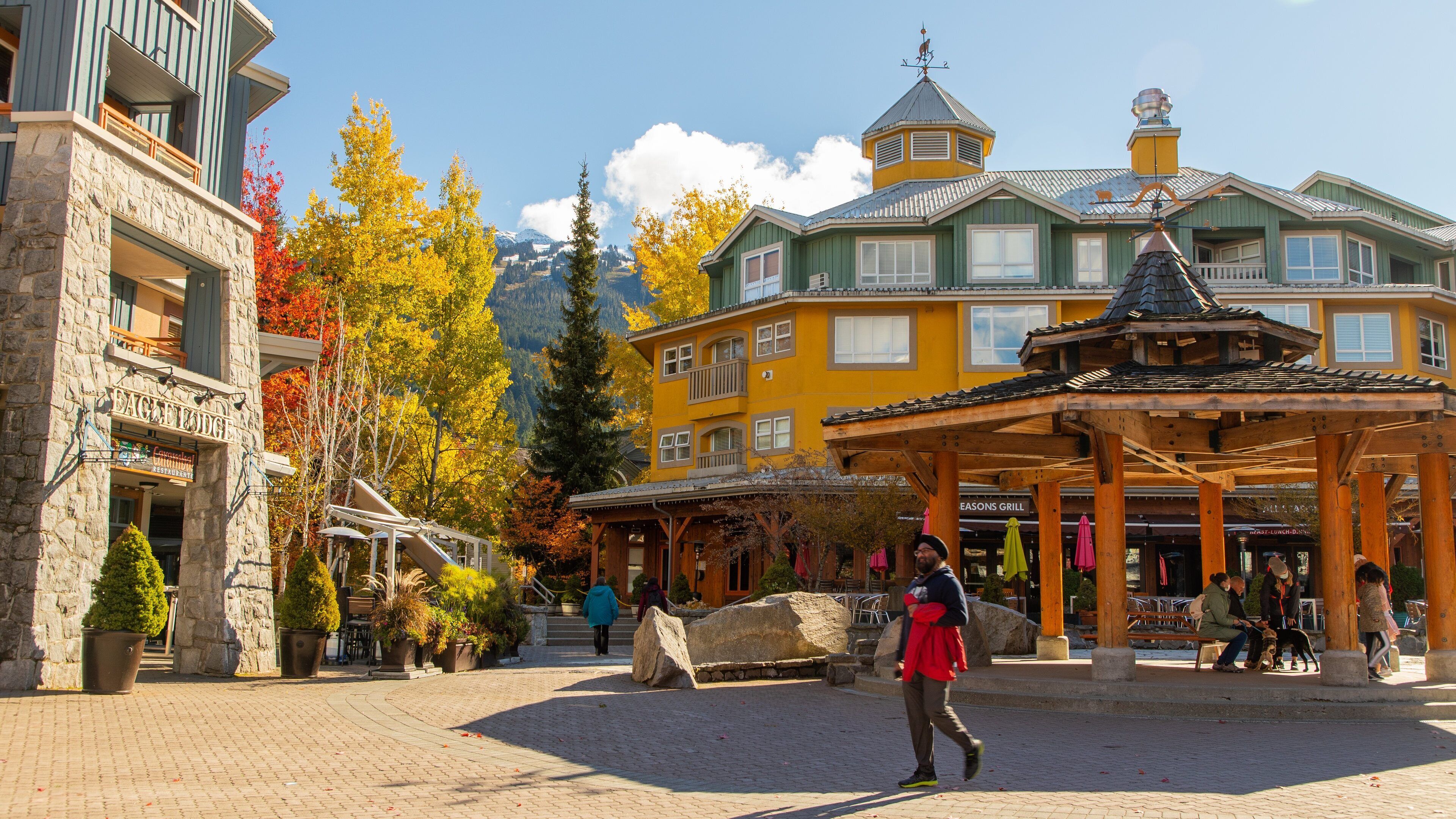 Whistler Village Stroll which includes street scenes as well as an individual male
