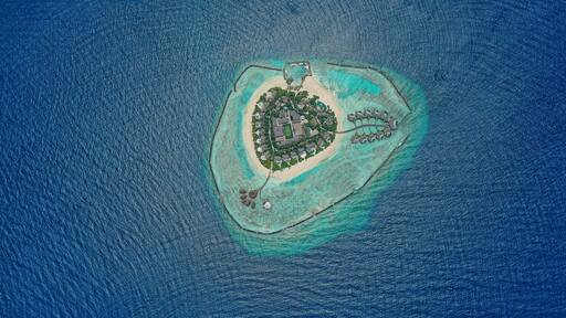 Aerial view of Thiladhoo island on Maldives archipelagos.