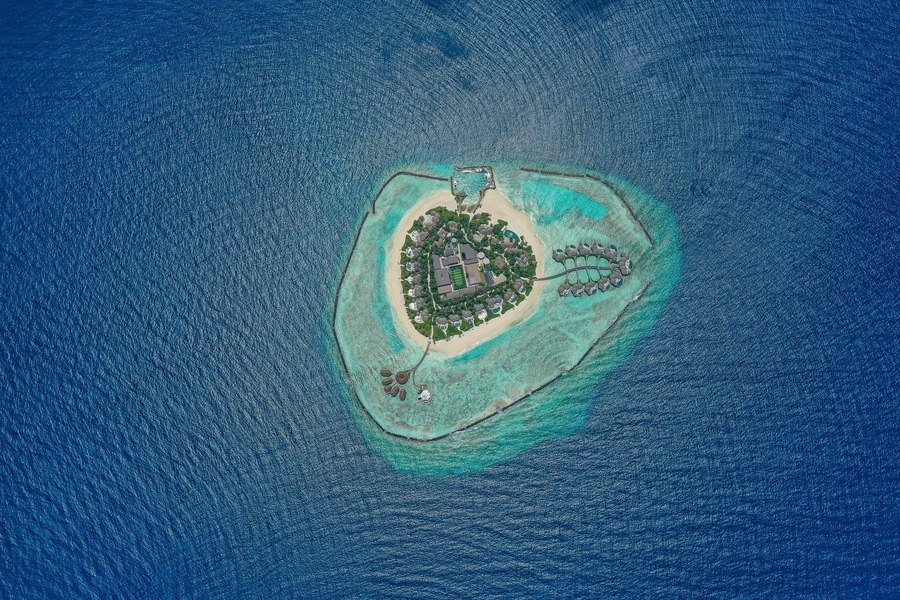 Aerial view of Thiladhoo island on Maldives archipelagos.
