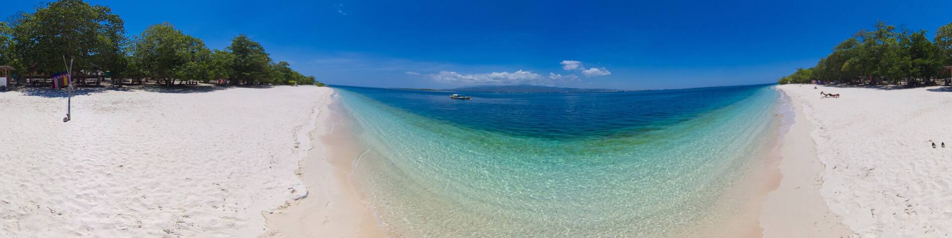 Tropical Great Santa Cruz island with beautiful beach and turquoise water. Zamboanga, Mindanao, Philippines.