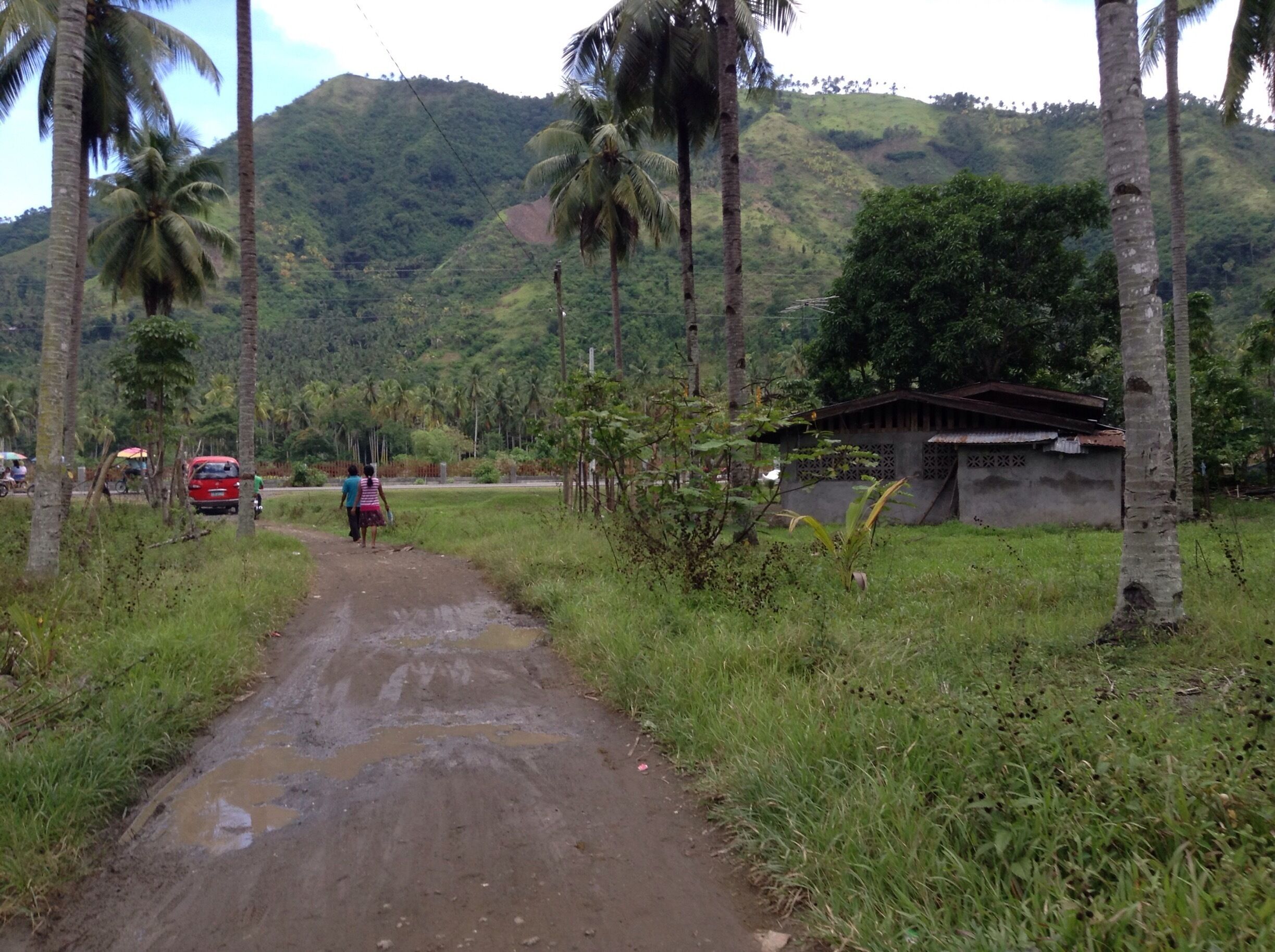 Believe it or not, but this is a cementery. It is located on Southern Philippines. There is no jeepney or taxi just tricycles, motorcycles, and just a few cars.