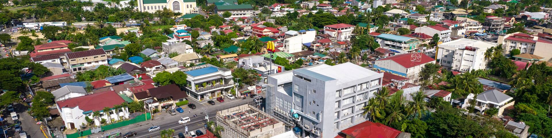 Naga, Camarines Sur, Philippines - Aerial of Naga City, with the Basilica of our Lady of Penafrancia visible behind.