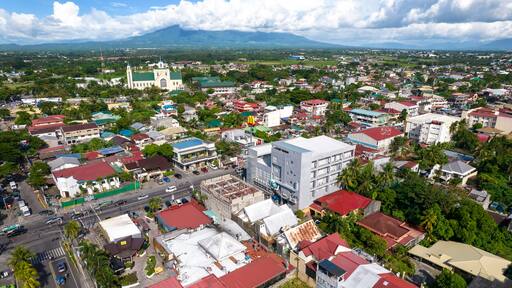Naga, Camarines Sur, Philippines - Aerial of Naga City, with the Basilica of our Lady of Penafrancia visible behind.