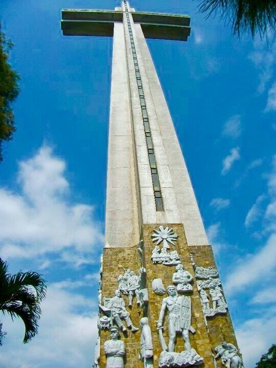 Mt. Samat is a historic mountain in the town of Pilar, Province of Bataan, Philippines. Located near its summit is the Mount National Shrine, a national shrine dedicated to the fallen Filipino and American fallen during World War II. There is an elevator inside so you can go up till the top of the cross and can see the beauty of the surroundings. Picture taken during family vacation. #Details Photo Sweepstakes