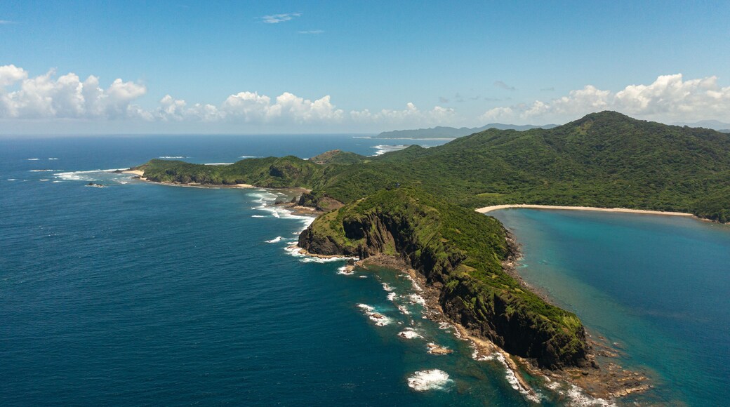 The coast of the island with beaches and rainforest. Cape Engano. Palaui Island. Santa Ana Philippines.