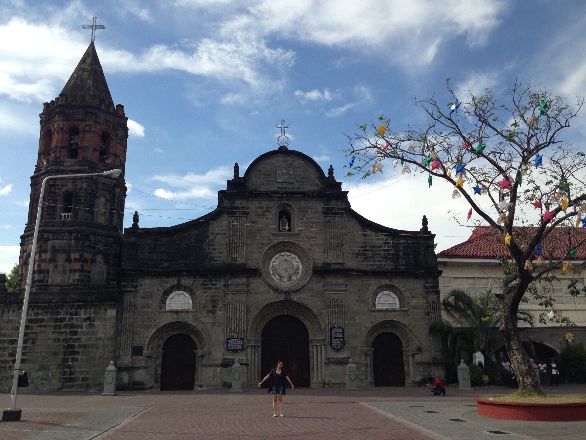 A historic church with a bell tower and a large dome.