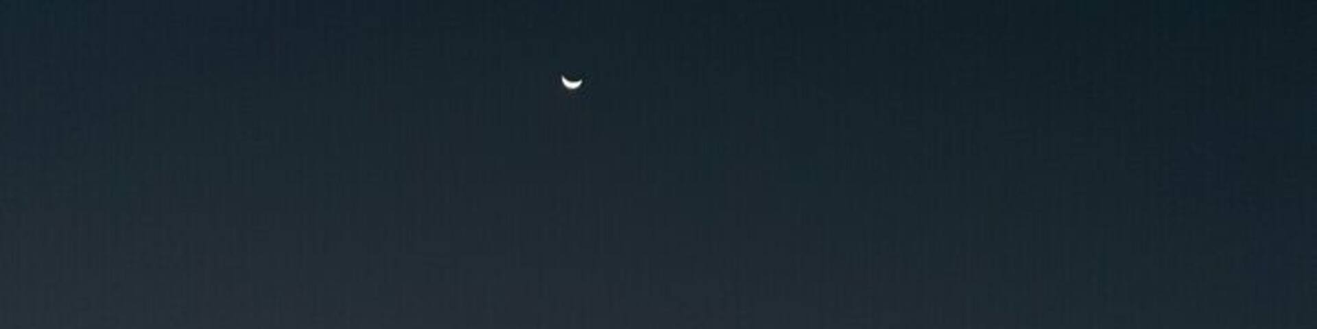 What a wonderful view straight from our backyard..
A crescent moon during sunset...