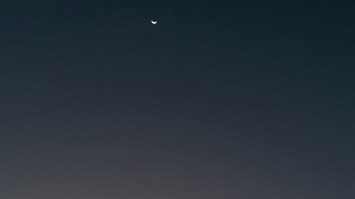 What a wonderful view straight from our backyard..
A crescent moon during sunset...
