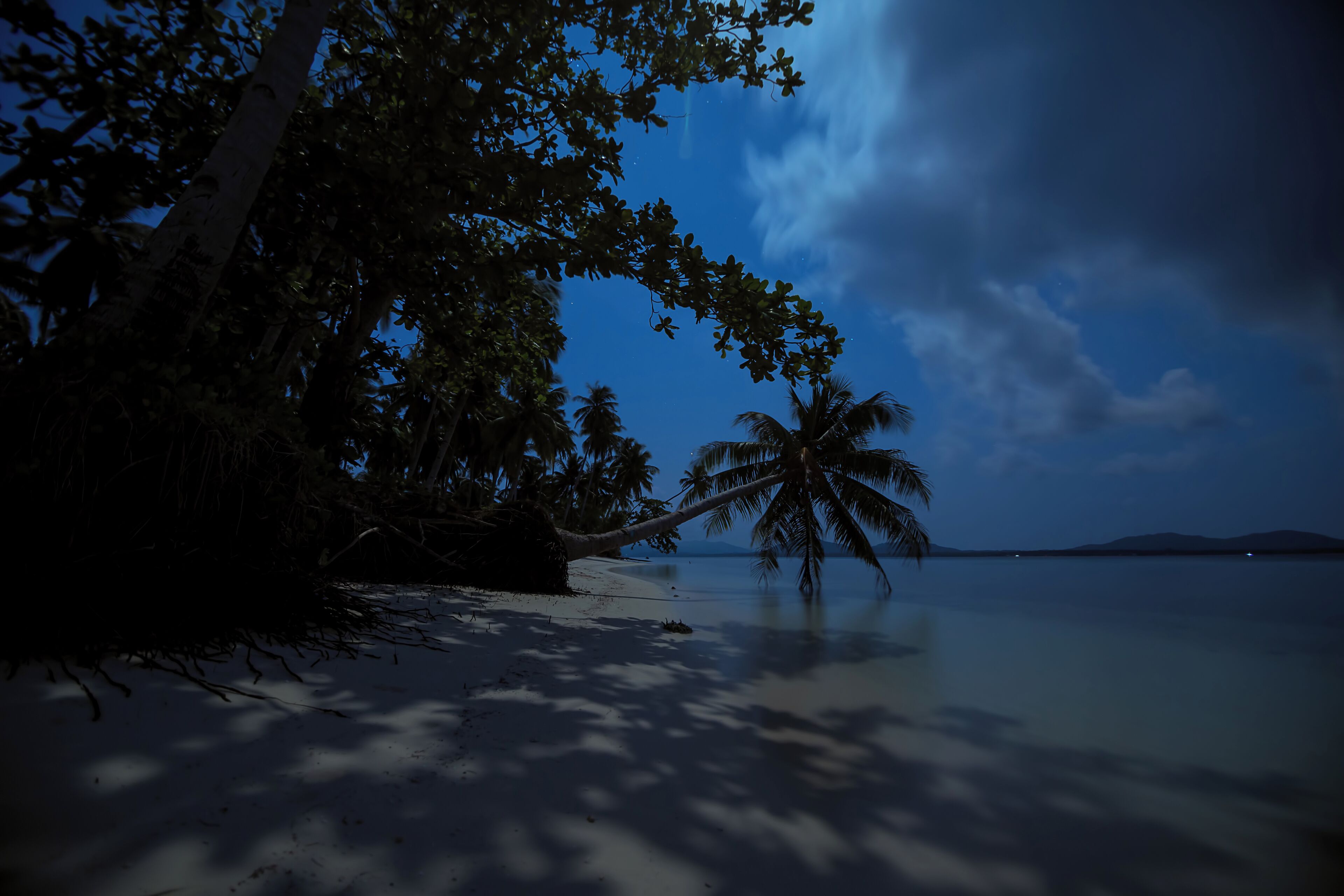 Strolling under the moonlight at 5am in Candaraman Island's pristine beaches.