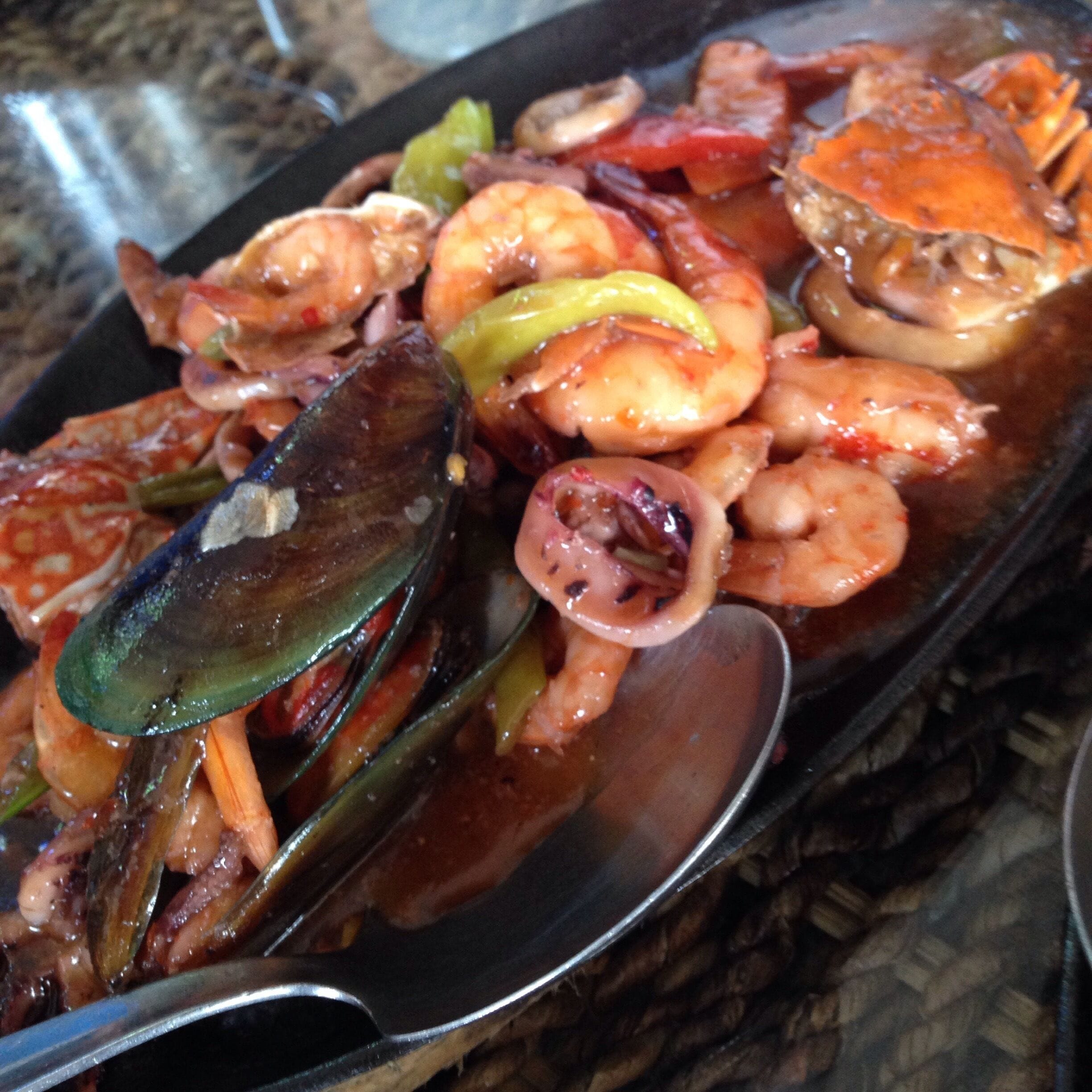 Sizzling Seafood
A mix of crab, shrimp, mussel and squid in a special sauce serve in a sizzling plate.

Pepper's Grill is a home grown restaurant in Bulacan that started in 2006. They offer delicious Filipino and Spanish Cuisine. The restaurant was named after the owner's son and it was featured in a TV program as top 4 most yummy place in Bulacan.

#Delicious