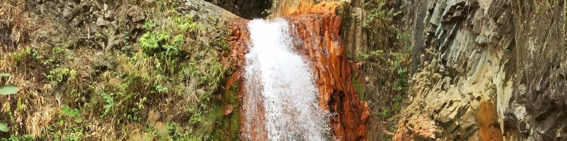 Pulangbato Falls. The rocks turn dark orange because of its sulfuric waters. amazing!!