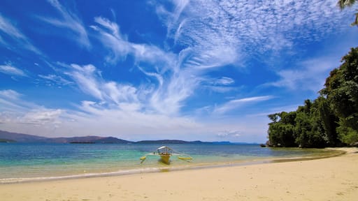The sky whips up an artful cloud display to complement the beauty and serenity of Candido Beach - one of the Philippines lesser known beaches. A boat ride away from the town of Carrascal in Surigao del Sur, I was very fortunate to have found this "hidden gem" under such great weather.