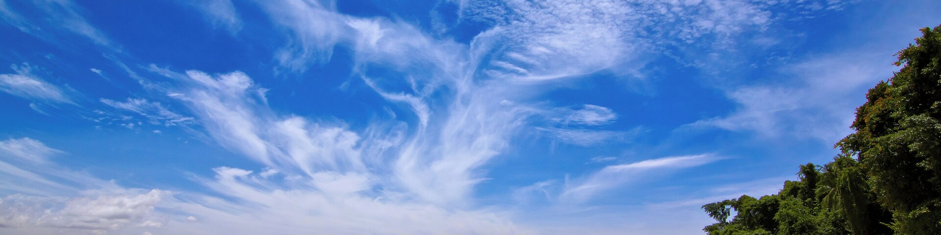 The sky whips up an artful cloud display to complement the beauty and serenity of Candido Beach - one of the Philippines lesser known beaches. A boat ride away from the town of Carrascal in Surigao del Sur, I was very fortunate to have found this "hidden gem" under such great weather.