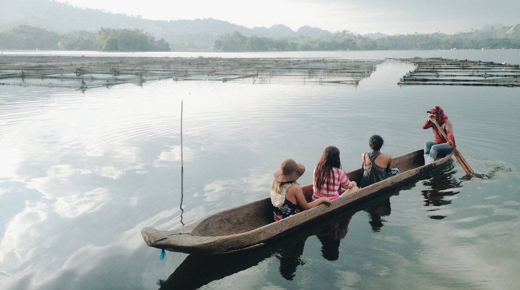 A fish-feeder was so kind to let us sit in her little boat and paddle us around the lake. Nothing could be more serene than seeing the clouds slip out from under us as we slid across the wrinkled mirror before the prow, musing about defining moments in our travels — and that this was one of them. #LikeALocal
Read more about this trip here: http://artbeatsmath.com/exploring-southern-mindanao/