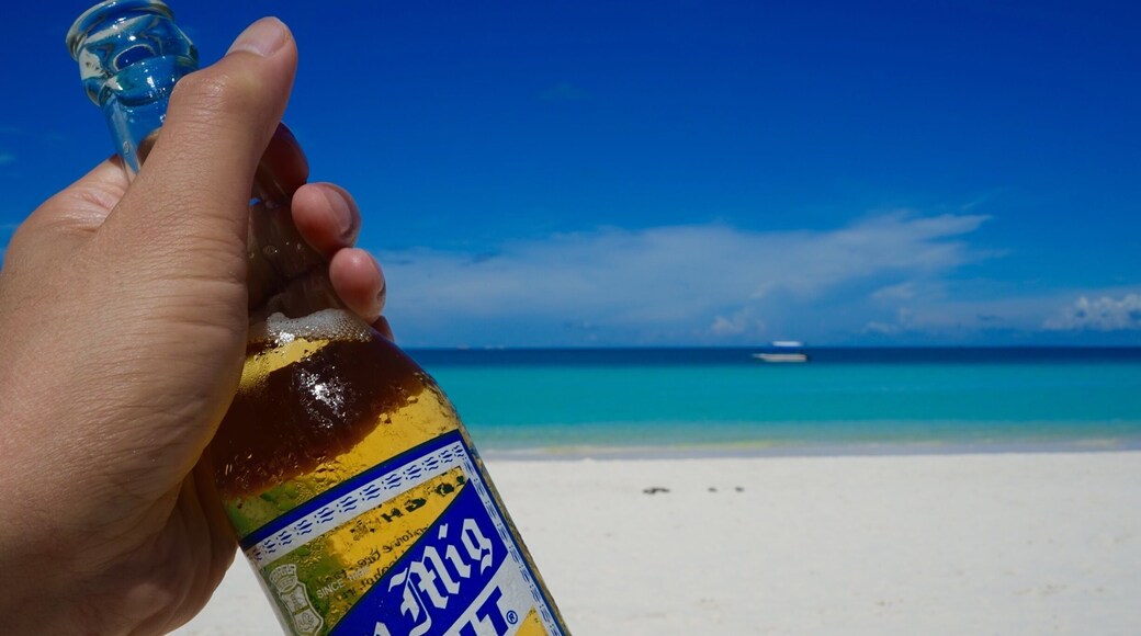 Chilling out along the white beach at the resort