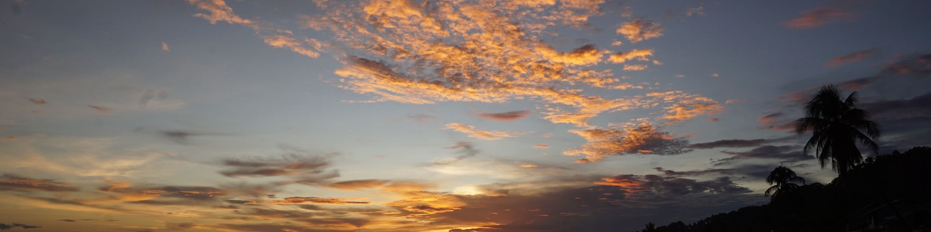 Sunset at a public park beside the beach.