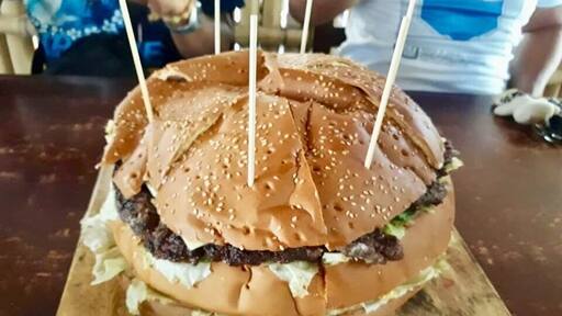 Its a giant burger when your hungry going Northern part of Philippines. #GoodEats photo contest