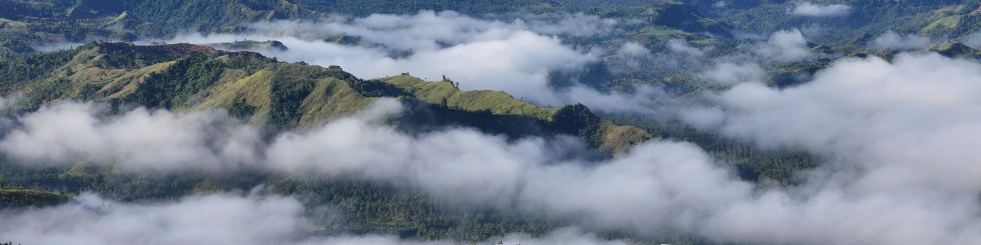 Misty Mountain Ridges Embraced by Low-lying Clouds in Claveria, Misamis Oriental