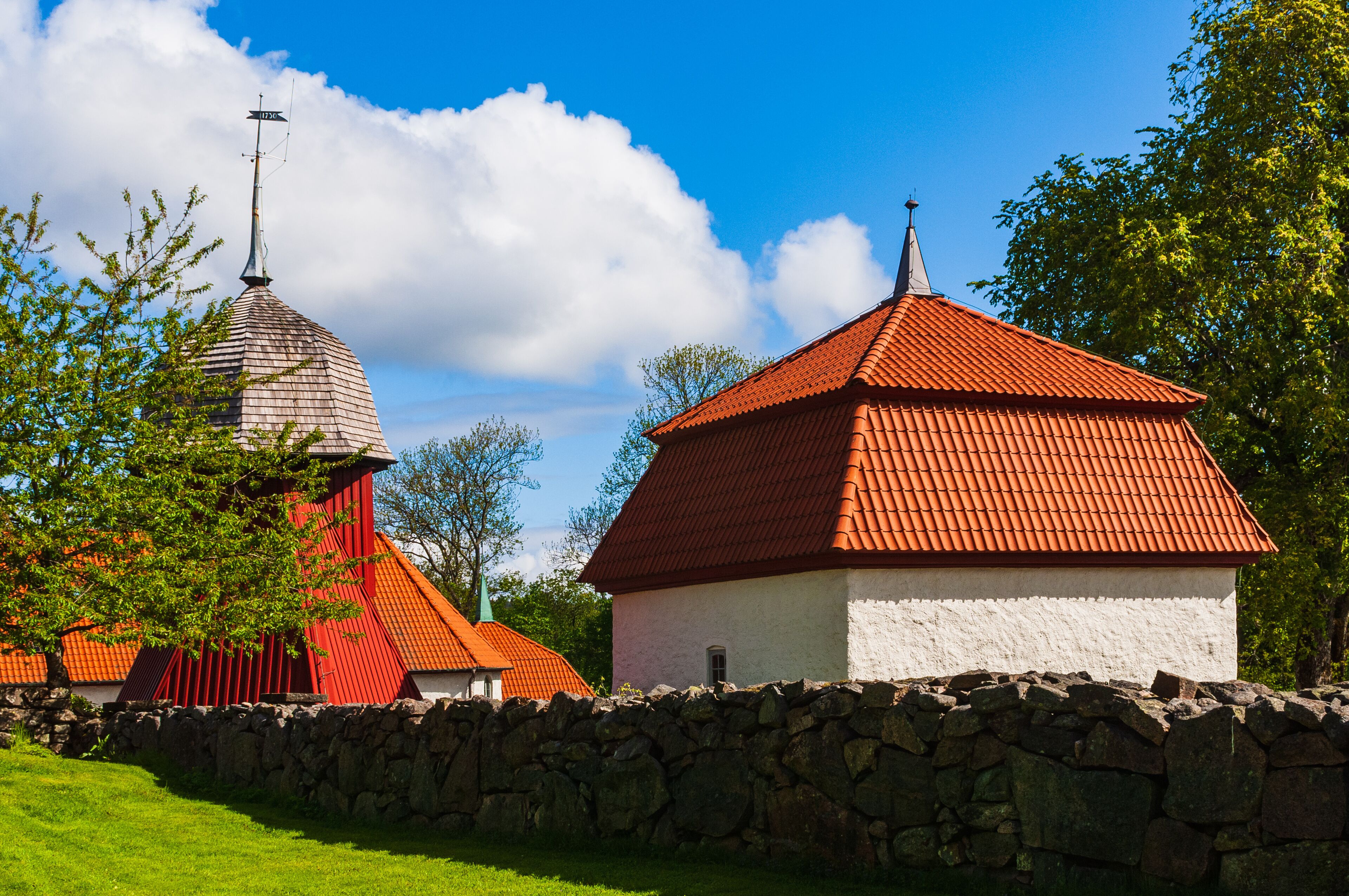 Stone wall in front of old church