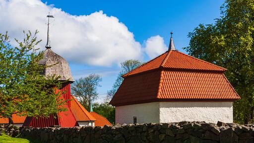 Stone wall in front of old church