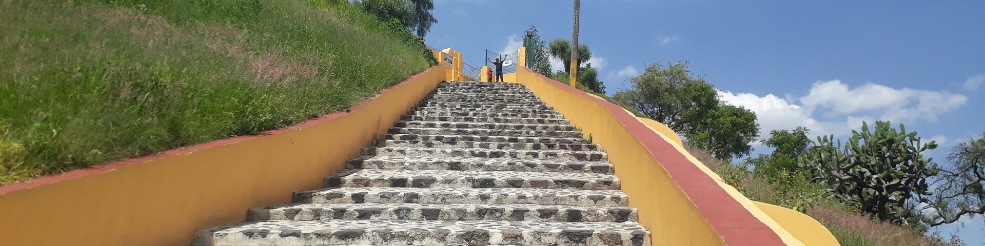 PANORAMIC VIEW OF TEMPLE AGAINST BUILDING