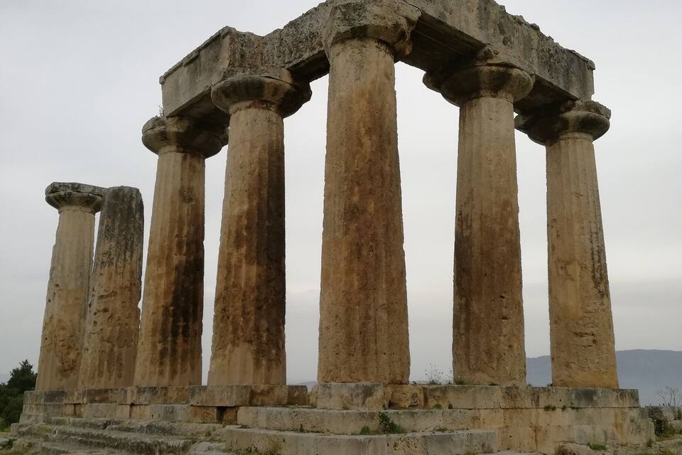 Ancient stone columns of a ruined temple.