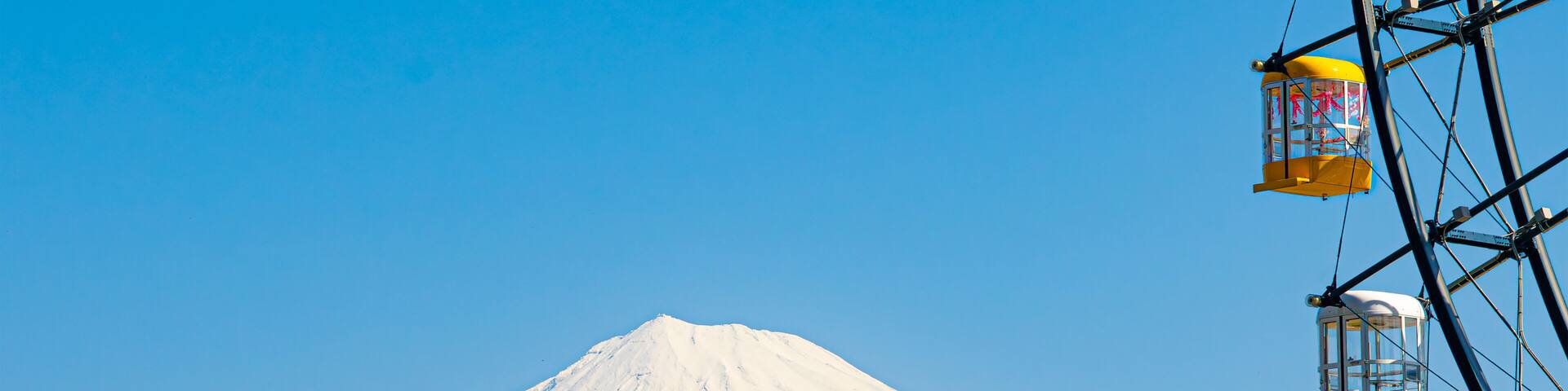 Ferris wheel and Mount Fuji.