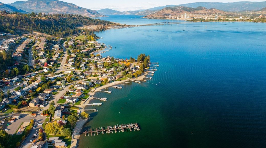 Okanagan Lake which includes landscape views, a small town or village and a lake or waterhole