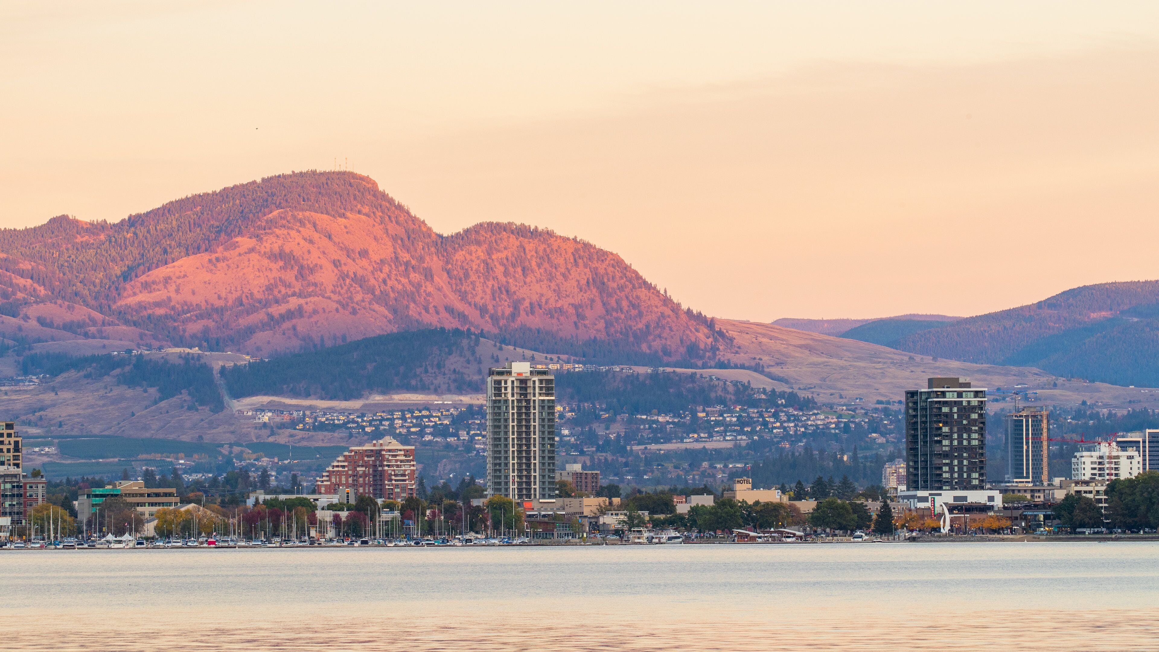 Okanagan Lake which includes landscape views, a coastal town and general coastal views