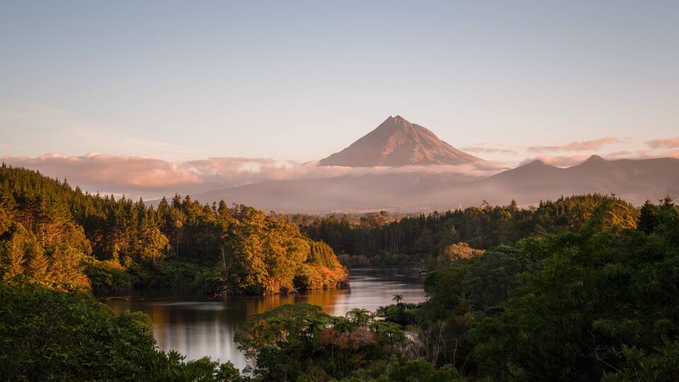 Sunset view of Mt Taranaki from Lake Mangamahoe, New Plymouth.