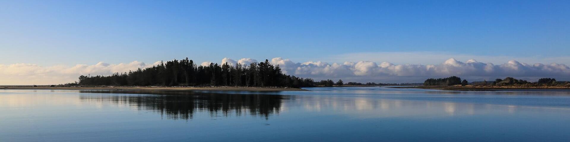 AT THE WAIMAKARIRI RIVER MOUTH, CALM AND SERENE. OFTEN SEE CANOEISTS TRAINING, SAILORS, FISHERMEN AND FABULOUS SCENERY IN THE EARLY MORNINGS. PHOTO TAKEN BY MY WIFE MAXINE COOPER