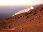 Descending while sun rises after reaching the top of Africa's highest peak, Mt. Kilimanjaro! (5895m)