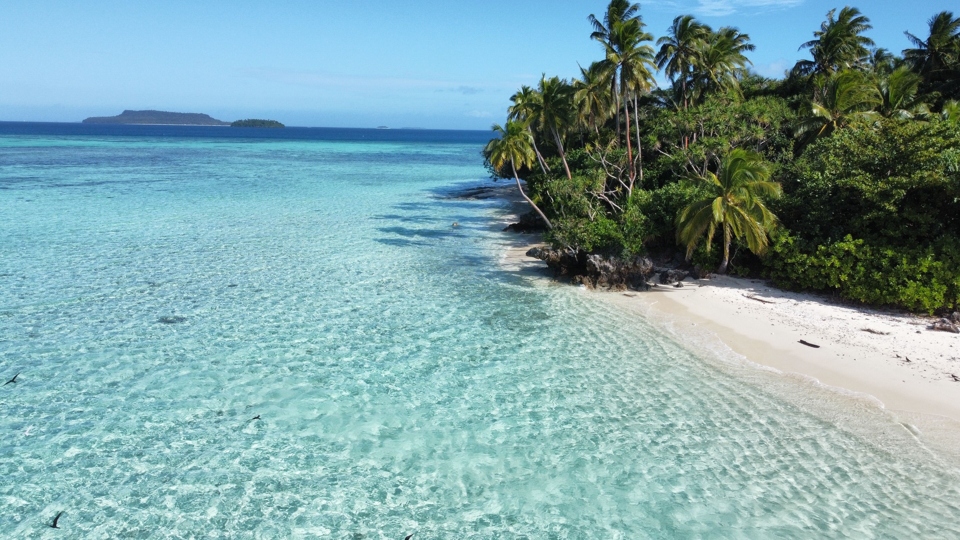 Aerial views of different islands in the Kingdom of Tonga