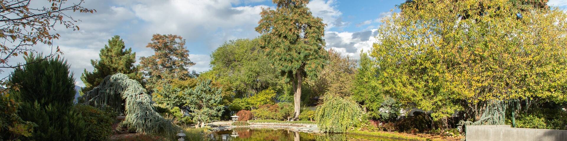 Penticton Ikeda Japanese Garden featuring a pond