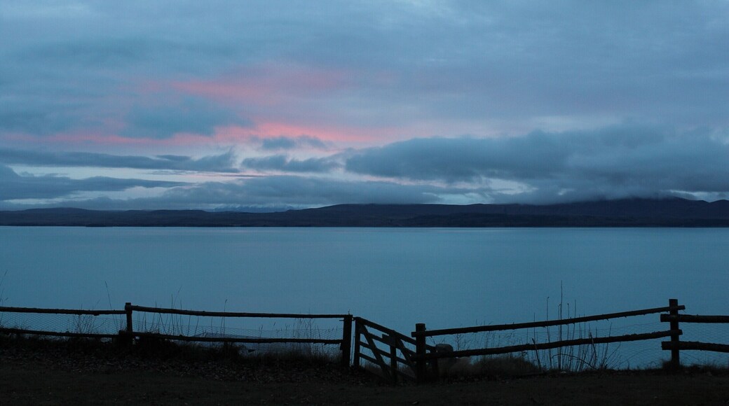 Lake Pukaki is an alpine lake near New Zealand's tallest mountain - Mount Cook, we did not have clear skies when we were there to get a shot of Mount Cook but the color of the water in this lake is amazing, We stayed in these cottages and woke up to this view - the fishermen of the group even caught a salmon in the canals that are located nearby