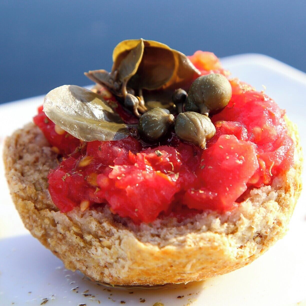 Tania and her mother prepare an extensive homemade breakfast every morning at their seaside hotel in Pollonia. This was one of the most impressive and authentic breakfasts we have encountered during our travels this year. This wholegrain crusty bread called "barley rusk" and is topped with grated tomato, fresh capers, oregano, sea salt, and a drizzle of olive oil. It's so simple, yet so fresh and delicious. The tomato is usually topped with cheese, but we opted for the vegan version sans fromage. 