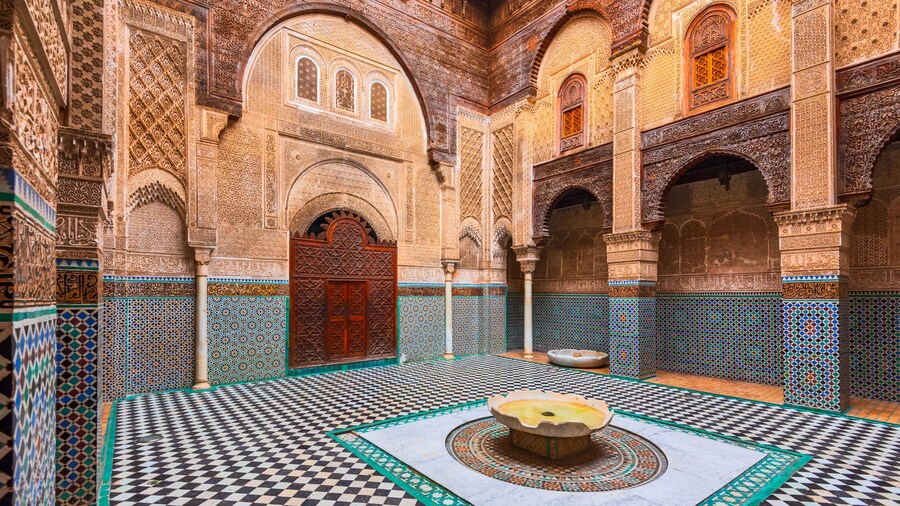 Fes, Morocco. The courtyard of Marinid Al-Attarine Madrasa of the perfumers, built in 14h Century in Fez medina.