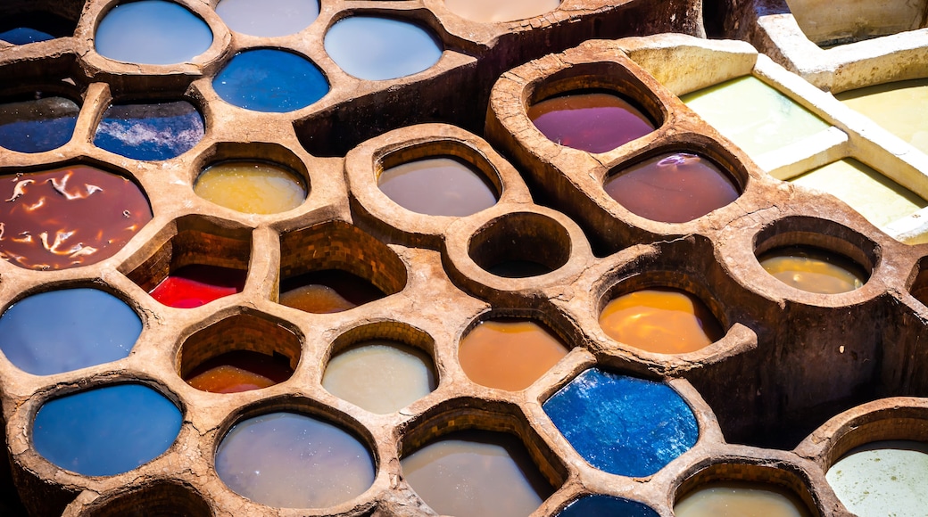 Fez is also famous for its old leather Tanneries. Old tanks of the Fez's tanneries with color paint for leather, Morocco, Africa. Artistic picture. Beauty world