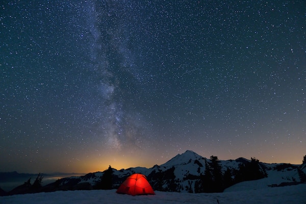 Milky Way and Mount Baker, red tent in foreground, taken at Artist Point in Mt. Baker-Snoqualmie National Forest.