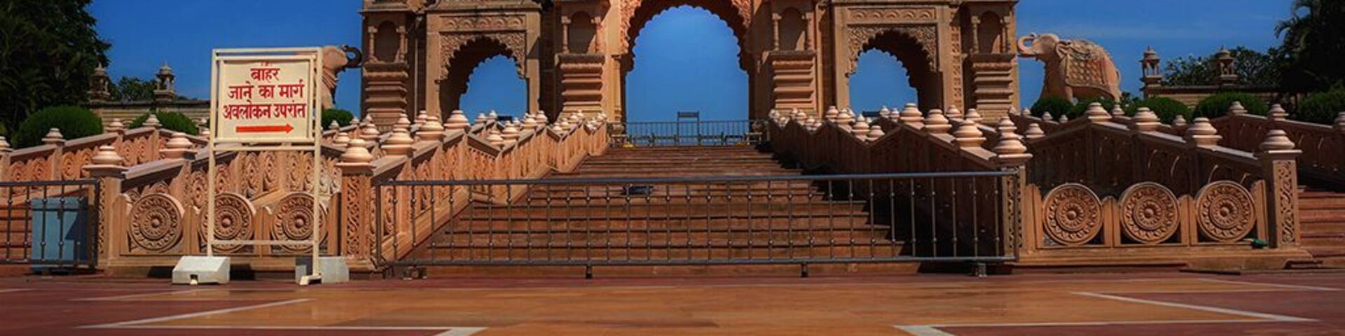 Entrance of Anand Sagar- Shegaon has a tourist attraction called "Anand Sagar", It is maintained by the The Gajanan Maharaj Sansthan. It surrounds a big artificial lake. It has a meditation centre, an aquarium, temples, play grounds, lush green lawns and open theatre where fountain-show is conducted for entertainment. It has been beautifully decorated with state of art artefacts and carvings all over. An amusement park has also started with a toy train encircling the entire place.
#StunningStructures