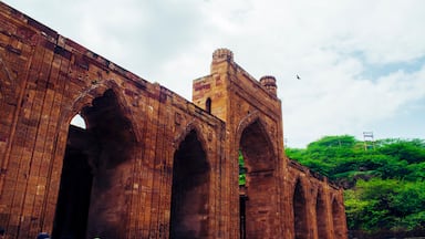 A historic stone bridge with intricate carvings and arches.