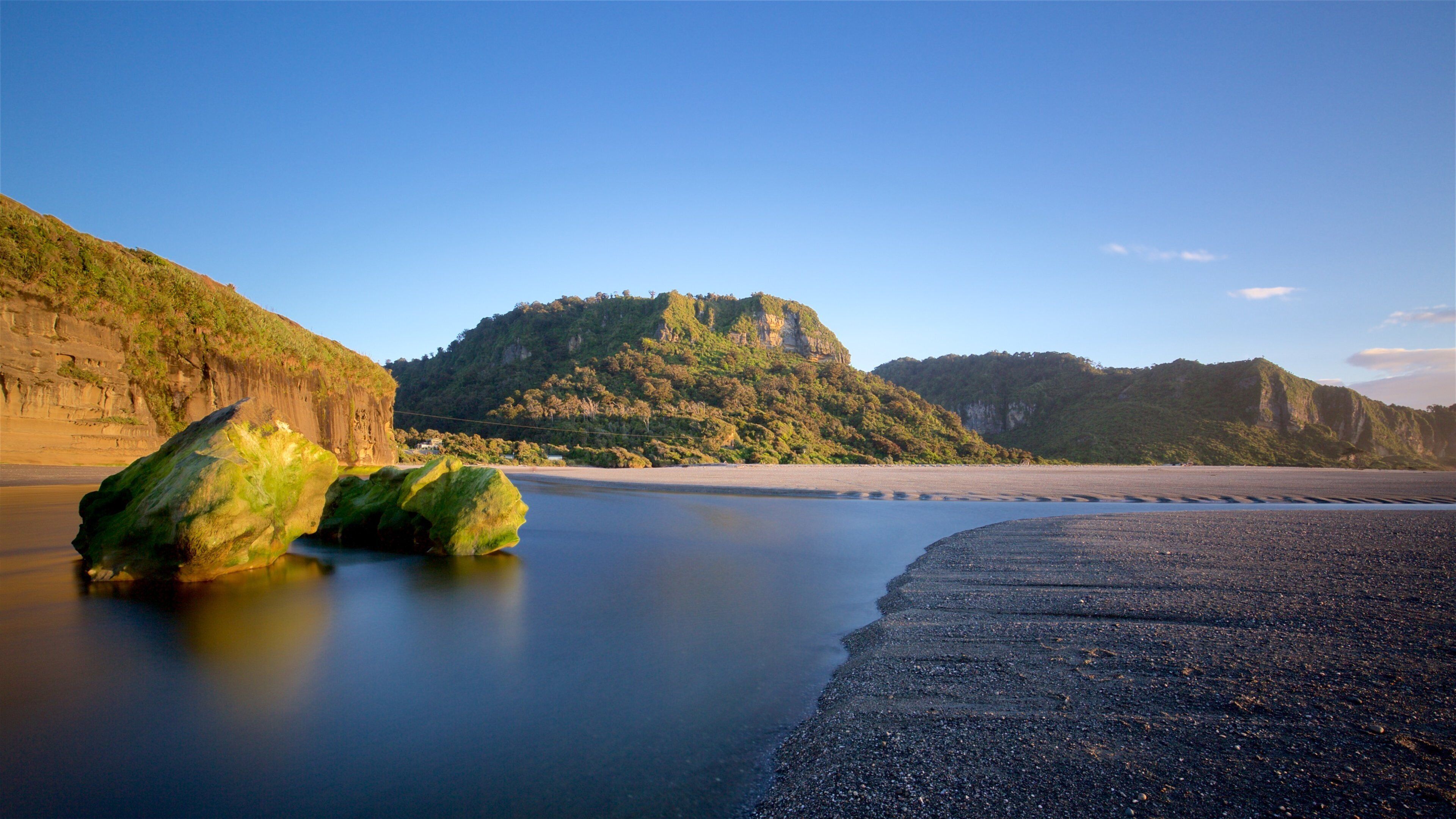 Punakaiki which includes a river or creek and mountains
