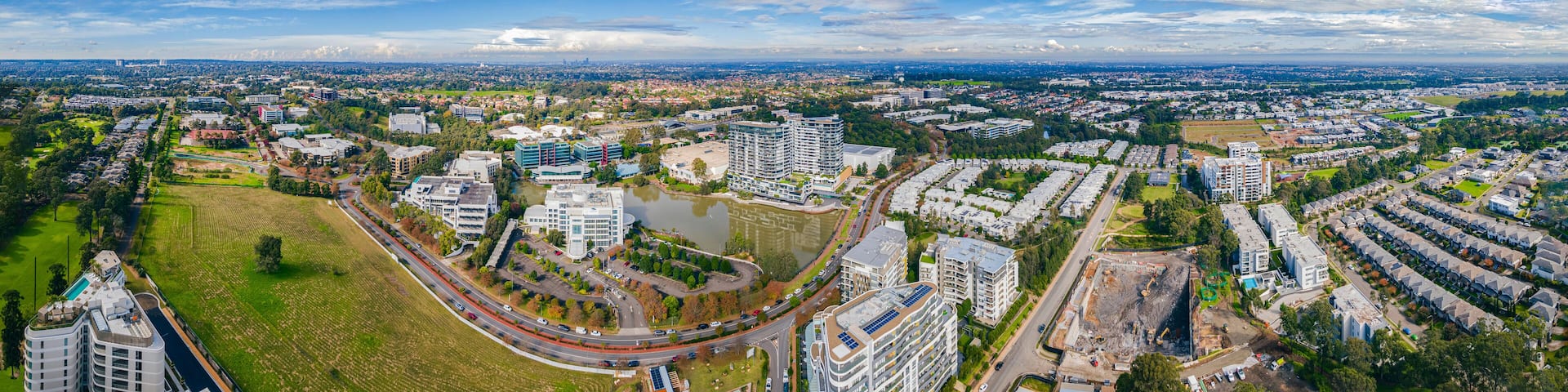 Panoramic Aerial drone view of Norwest Business Park in the suburbs of Norwest and Bella Vista in the Hills Shire, North West Sydney, New South Wales, Australia