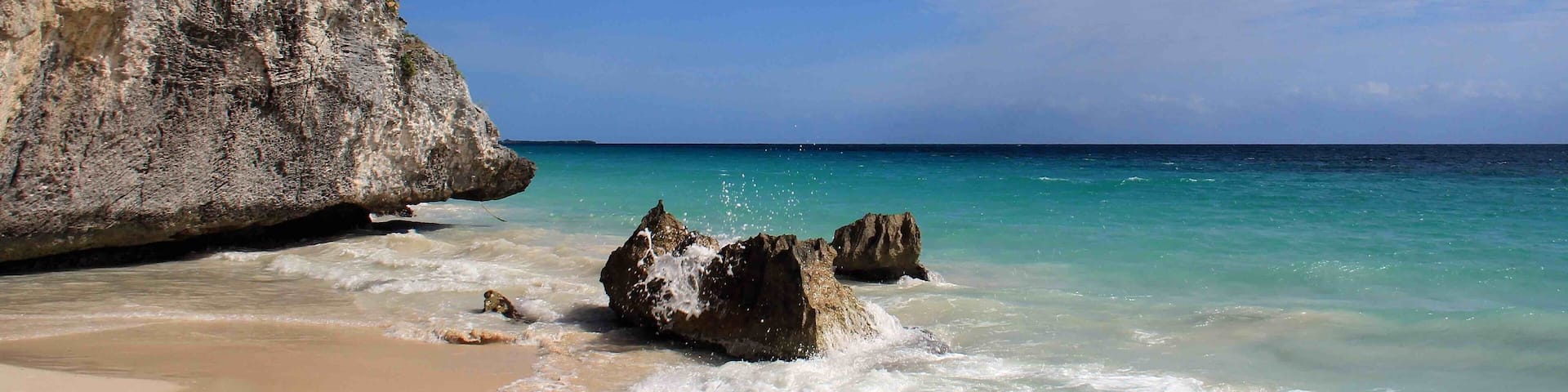 This pic was taken at the hidden beach at the Tulum Mayan Ruins in Mexico. After exploring the ruins and looking for a place to cool off, look for the wooden viewing platform and take the stairs down to the beach and you will find an amazing beach. Great for a quick swim. If you continue walking on the beach, there are several areas that will take you away from the crowds and allow you to explore a little further.