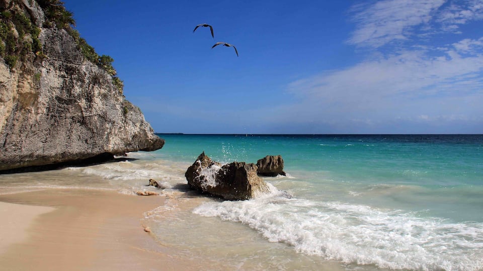 This pic was taken at the hidden beach at the Tulum Mayan Ruins in Mexico. After exploring the ruins and looking for a place to cool off, look for the wooden viewing platform and take the stairs down to the beach and you will find an amazing beach. Great for a quick swim. If you continue walking on the beach, there are several areas that will take you away from the crowds and allow you to explore a little further.