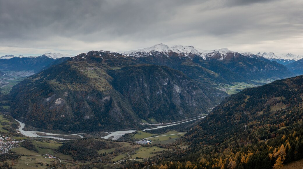 mountain landscape with the Rhine river in the Swiss Alps in late autumn